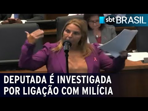 Deputada L&uacute;cia Helena &eacute; investigada por liga&ccedil;&atilde;o com mil&iacute;cia do RJ | SBT Brasil (18/12/23)