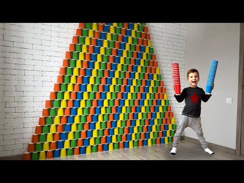 Giant pyramid of colored cups. Video for kids.