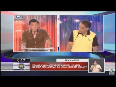 Duterte, Roxas clash on gov't health program