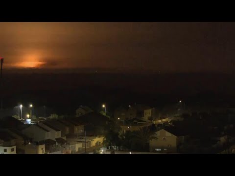 Explosions light up Gaza night sky