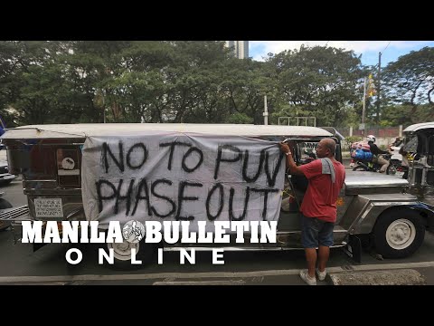 Tranport groups and other various members hold protest in front of LTFRB