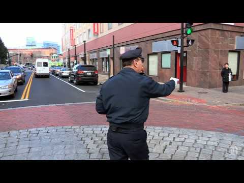 Dancing Cop, still traffic jamming at 64