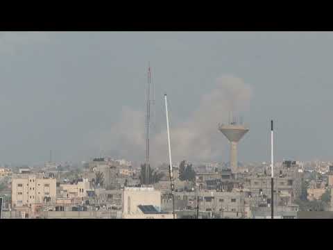 Smoke rises above Khan Yunis as Israeli drone flies over Rafah | AFP