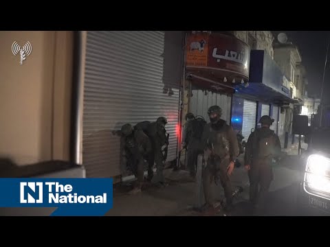 Israeli forces raid money exchange shops in occupied West Bank