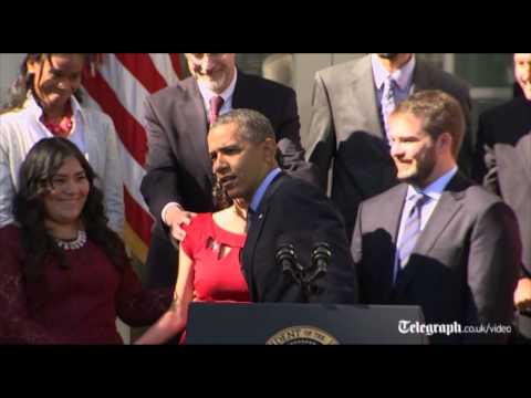 Obama catches fainting pregnant woman during speech