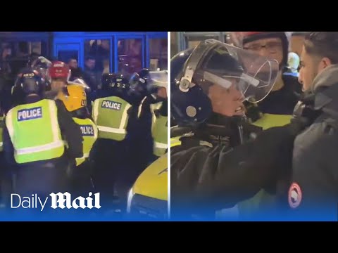 Moment protestors clash with police at pro-Palestine rally in London