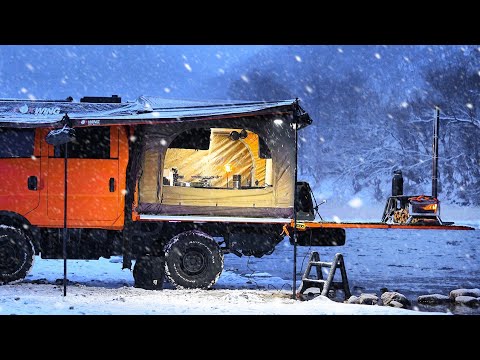 Winter camping on ice water with a transformation truck