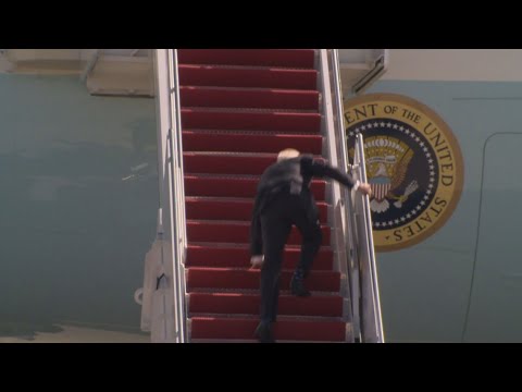 President Biden falls down walking up steps of Air Force One