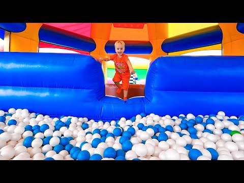 Vlad and Niki play in Inflatable Castle and other funny challenges for kids