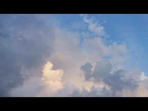 4K The movement of clouds in a clear sky to overcast. Quite calm. Fast video up to 15x the speed.