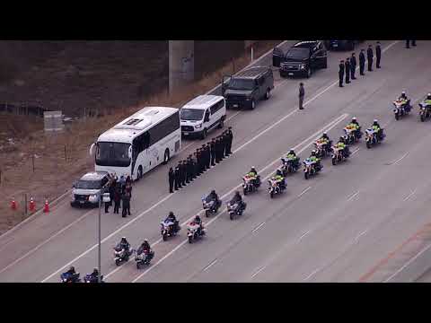 Powerful procession for slain Colorado deputy stretches for miles