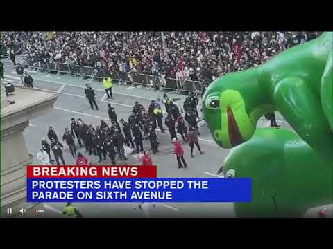 Pro-Palestinian protesters appear to glue hands to street during NYC Macy's Thanksgiving Day Parade