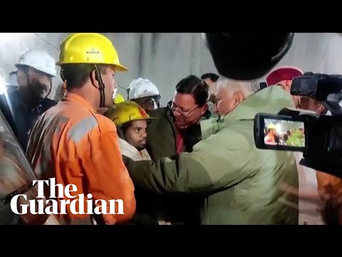 Rescuers evacuate Indian construction workers trapped in tunnel