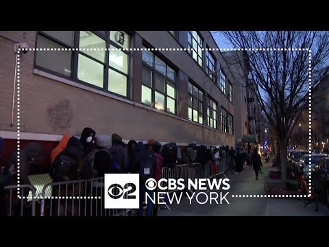 Asylum seekers line up in cold to be placed in NYC shelters