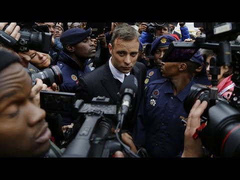 South African athlete Oscar Pistorius is freed on parole after serving 9 years in prison