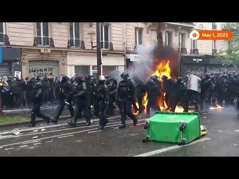 Petrol bomb engulfs Paris police in flames