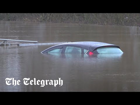 UK Weather: Flood warnings continue as cars, boats, and businesses are submerged by water