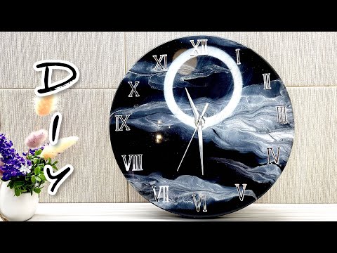 Epoxy resin clock 30 cm. Black with silver. Resin Art.