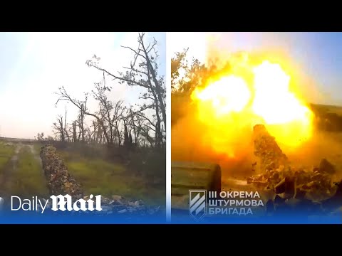 Moment Ukrainian tanks blast Russian trenches at point-blank range near Bakhmut