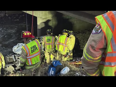 New pictures show rescue of man found trapped in truck under Indiana bridge