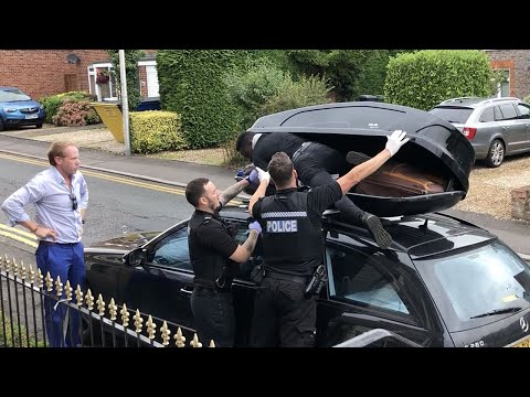 Moment migrant discovered in car box as couple return from France