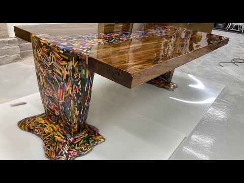 Thousands of Pencils Floating Down a River Table..