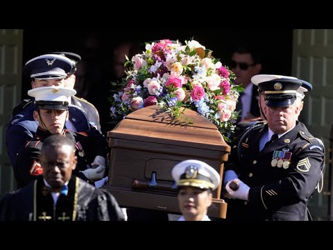 Former President Jimmy Carter follows Rosalynn Carter's casket in procession