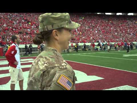 Army Captain surprises daughter at Wisconsin Football Game