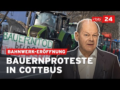 Bauern demonstrieren bei der Er&ouml;ffnung des neuen ICE-Werks