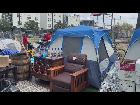 Denver police clean up homeless encampment after outdoor bar reported