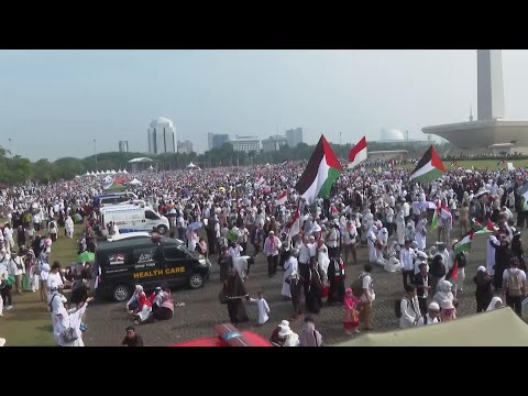 Thousands of protesters march in Indonesia's capital to show solidarity with Palestinians