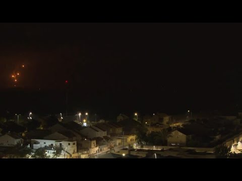 Flares continue to light up night skies above Gaza as fighting rages