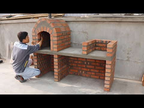 DIY pizza oven with red brick and cement