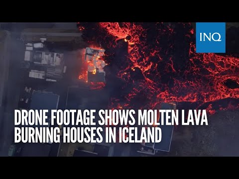 Drone footage shows molten lava burning houses in Iceland