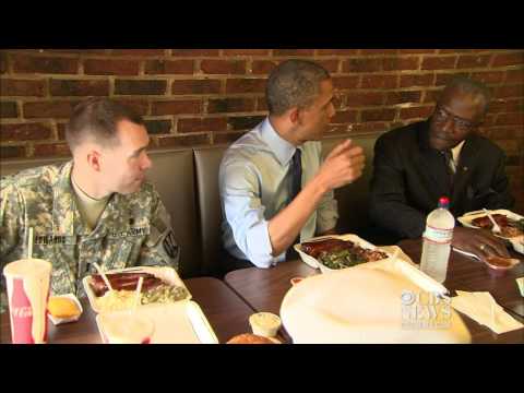 Obama lunches on BBQ with military fathers