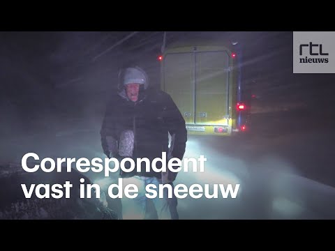 Metershoge sneeuw in Oekra&iuml;ne: 'We slapen nog minstens een nacht in de auto'