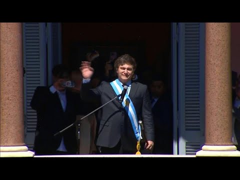 Argentina's president Milei greets supporters from balcony | AFP