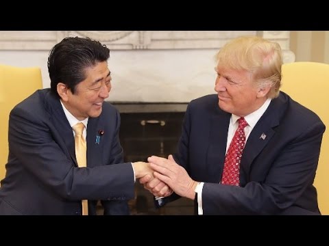 Trump shakes Japanese PM's hand for 19 seconds