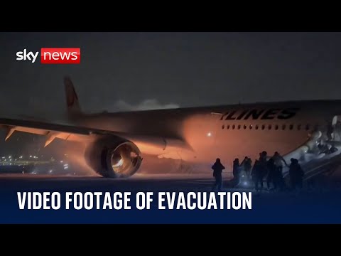 BREAKING: New footage of passengers evacuating burning plane in Japan