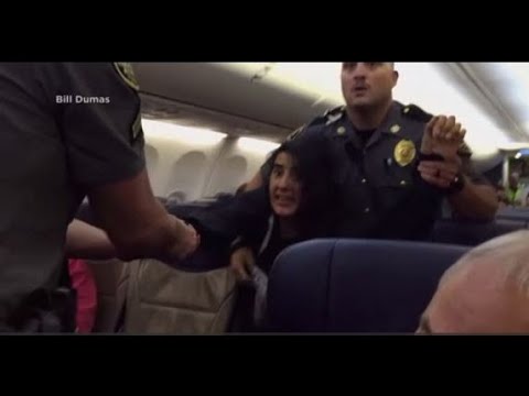 VIDEO: Woman dragged off Southwest Airlines flight