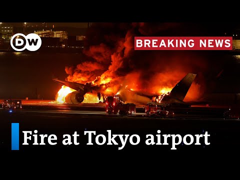 Japan: Passenger plane bursts into flames on runway  | DW News