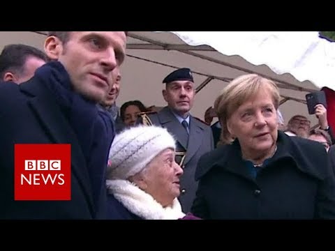 Old lady mistakes Chancellor Merkel for Macron's wife - BBC News