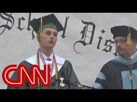 Valedictorian's mic cut after he bashes school