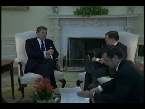 President Reagan meeting with Senator John Tower on November 15, 1982