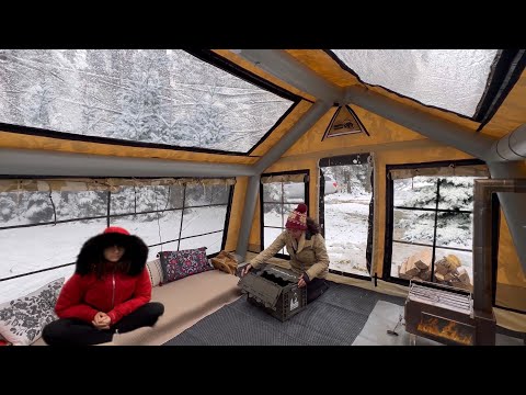 SNOW CAMPING WITH AN INFLATABLE TENT IN MAY