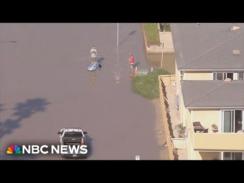 High surf floods Southern California neighborhood