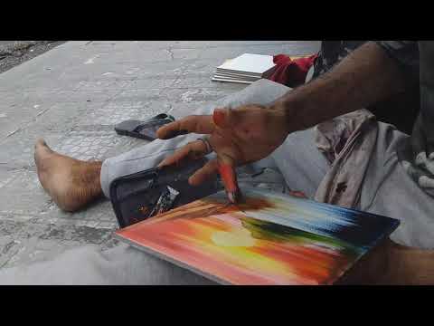 painting by a homeless man with depression in downtown (centro) Manaus, Brazil