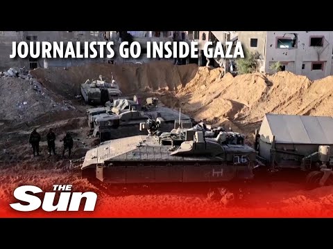 Journalists see a Hamas weapons workshop and Gaza's devastation as they go inside with Israeli army