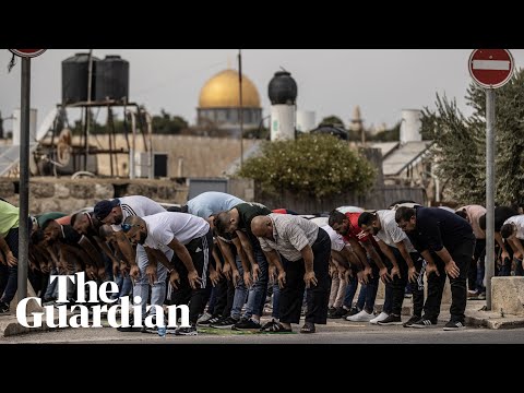 Palestinians pray outside as Israel tightens security around al-Aqsa mosque