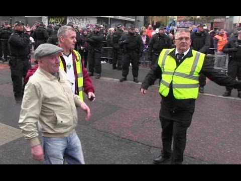 Dissident Republicans parade through Royal Ave...